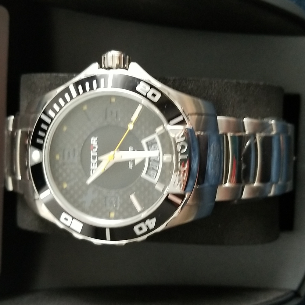 Sector men watch.  Stainless steel with black interior.  New excellent condition